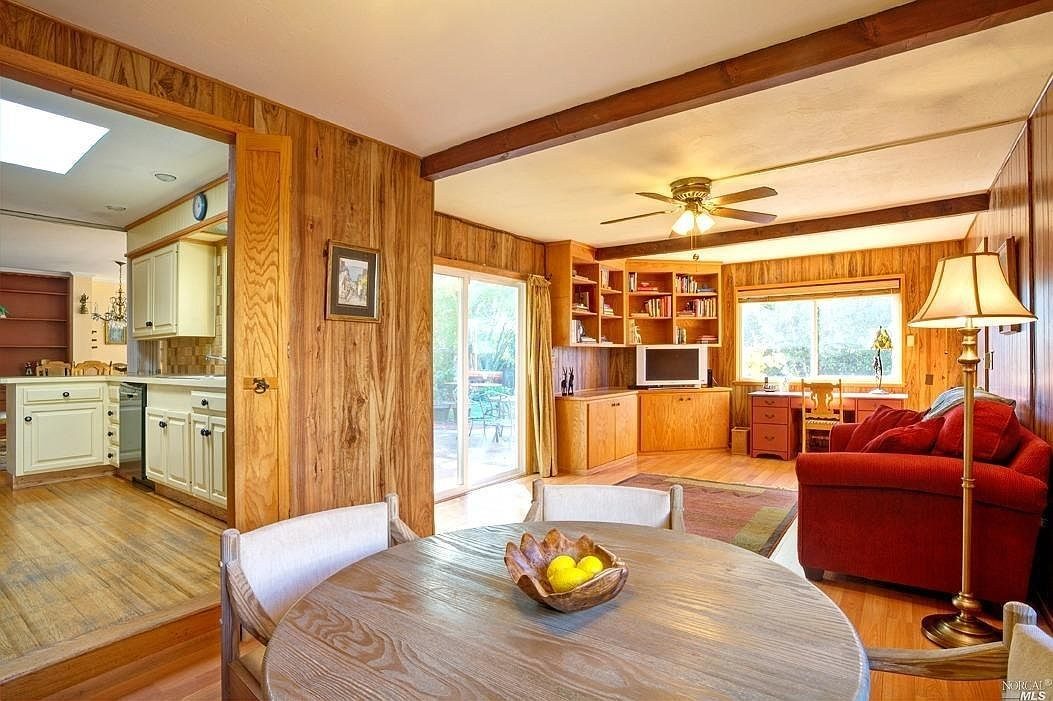 The wood-paneled family room
