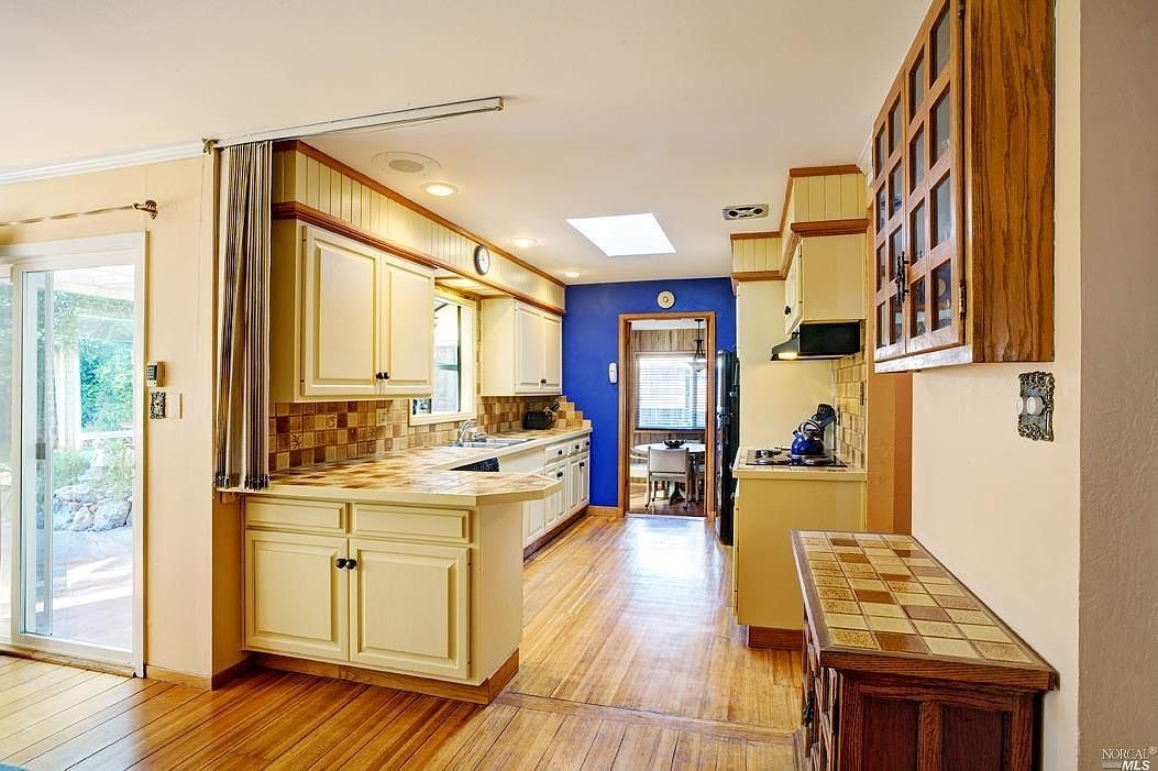 The kitchen and the dining area beyond